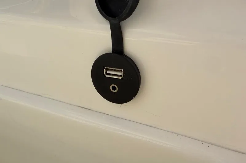 Slide: The Image of USB port on 2026 Key West 239 FSR boat exterior. - 53