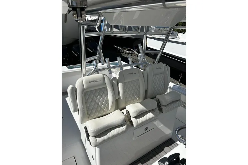 Slide: The Image of Luxurious seating on 2023 Front Runner 39 Center Console boat, featuring diamond-stitched upholstery. - 12