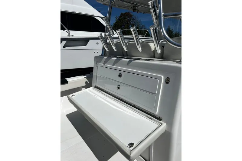 Slide: The Image of 2023 Front Runner 39 Center Console boat with storage compartments and rod holders. - 9