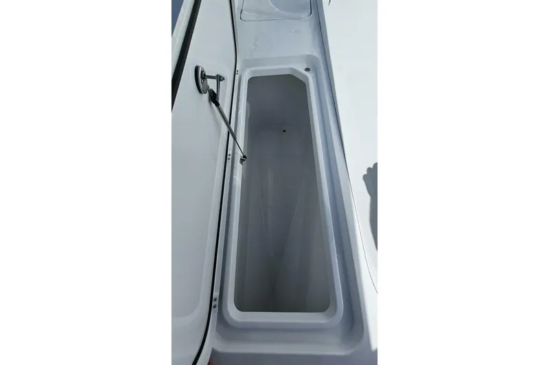 Slide: The Image of Open storage compartment on 2025 Costa Custom Boats 34ST. - 20