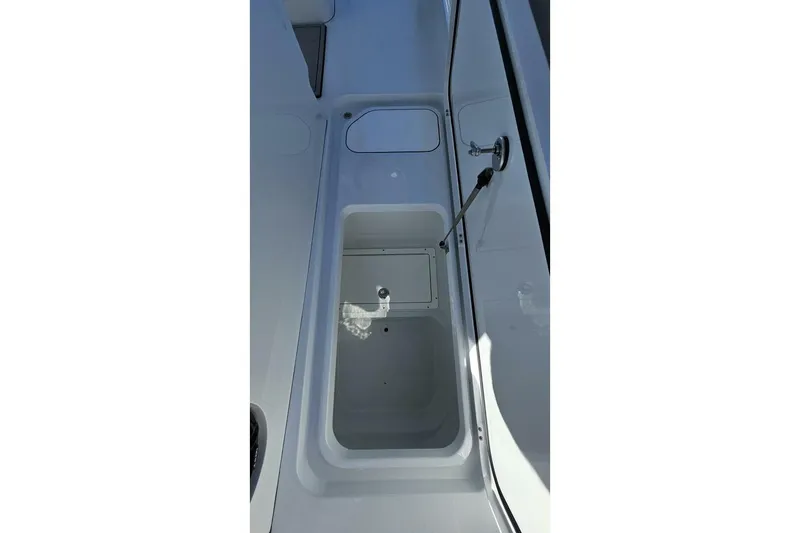 Slide: The Image of 2025 Costa Custom Boats 34ST interior compartment detail, showcasing sleek design and functionality. - 22
