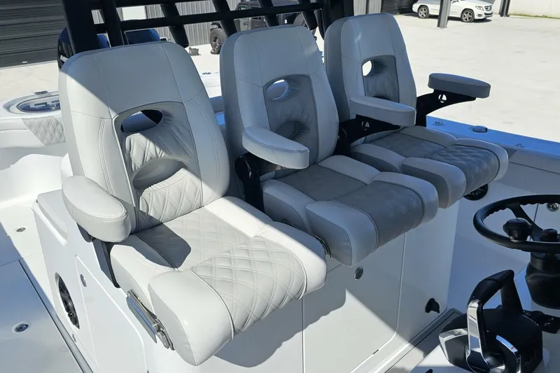 Slide: The Image of Luxury seating on 2025 Costa Custom Boats 34ST, featuring plush, ergonomic design. - 25