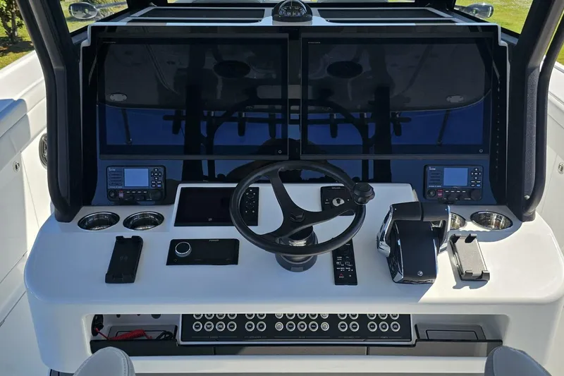 Slide: The Image of 2025 Costa Custom Boats 34ST dashboard with advanced navigation and control systems. - 27