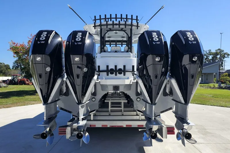 Slide: The Image of 2025 Costa Custom Boats 34ST with four powerful 300 V8 engines, rear view. - 3