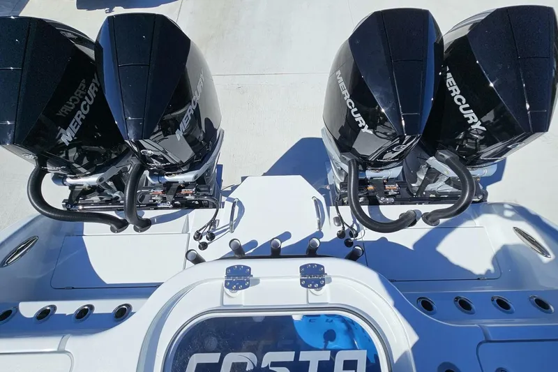 Slide: The Image of 2025 Costa Custom Boats 34ST with dual Mercury outboard engines, top view. - 44