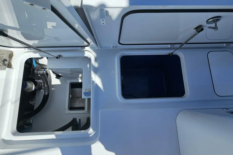 Slide: The Image of 2025 Costa Custom Boats 34ST interior compartments and storage view. - 53