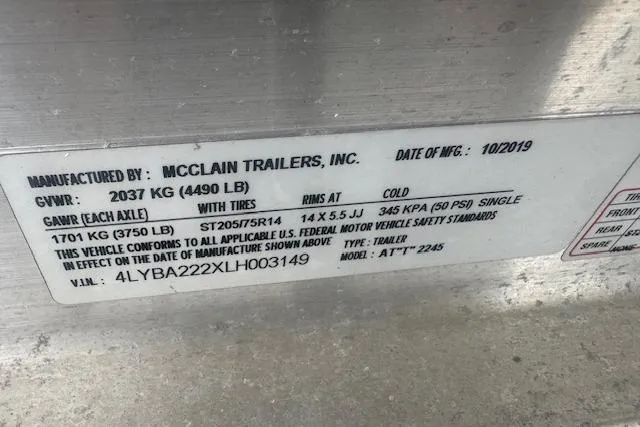 Slide: The Image of Label on McClain trailer, detailing specifications and manufacturing date, October 2019. - 15