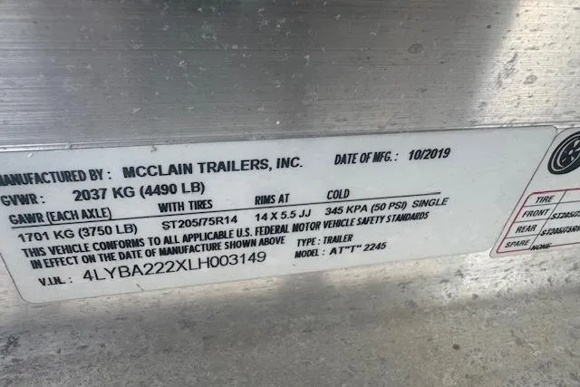 Slide: The Image of Trailer label showing specifications and manufacturing details by McClain Trailers, Inc., dated 10/2019. - 23