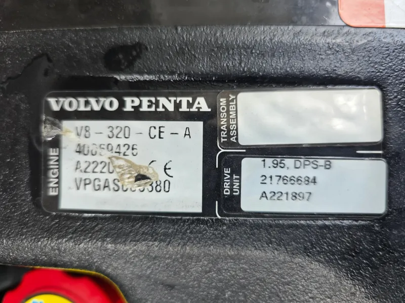 Slide: The Image of Volvo Penta engine plate on a Four Winns H310 boat. - 43