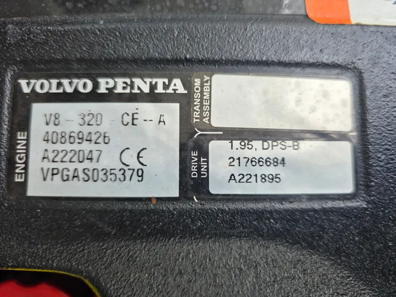 Slide: The Image of Volvo Penta engine plate on a Four Winns H310 boat. - 44