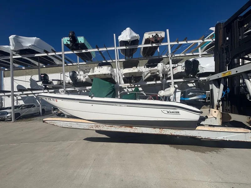 The Image of Boston Whaler 180 Dauntless 2000 on outdoor boat trailer. - 0