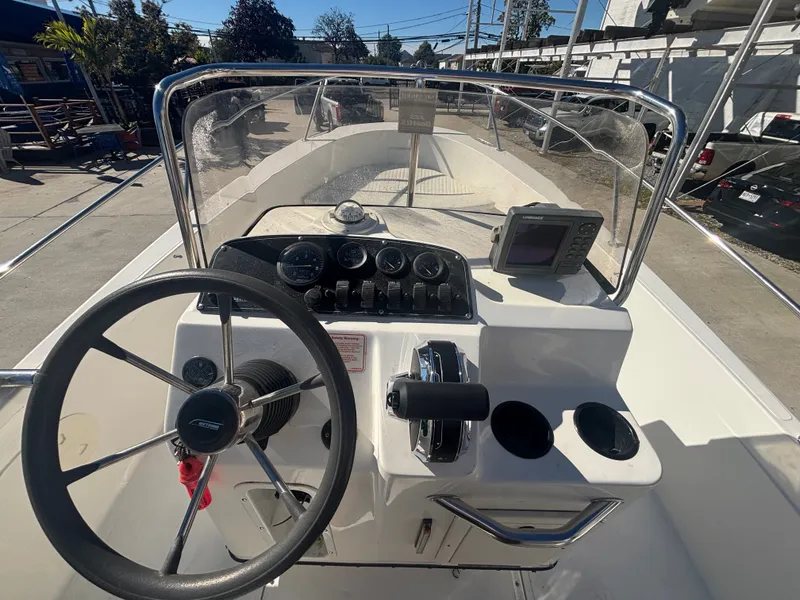 Slide: The Image of Helm console of a 2000 Boston Whaler 180 Dauntless. - 10