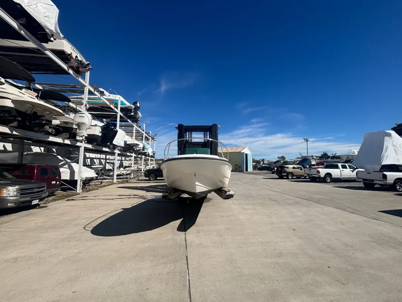 Slide: The Image of Boston Whaler 180 Dauntless 2000 at a boatyard under clear skies. - 2