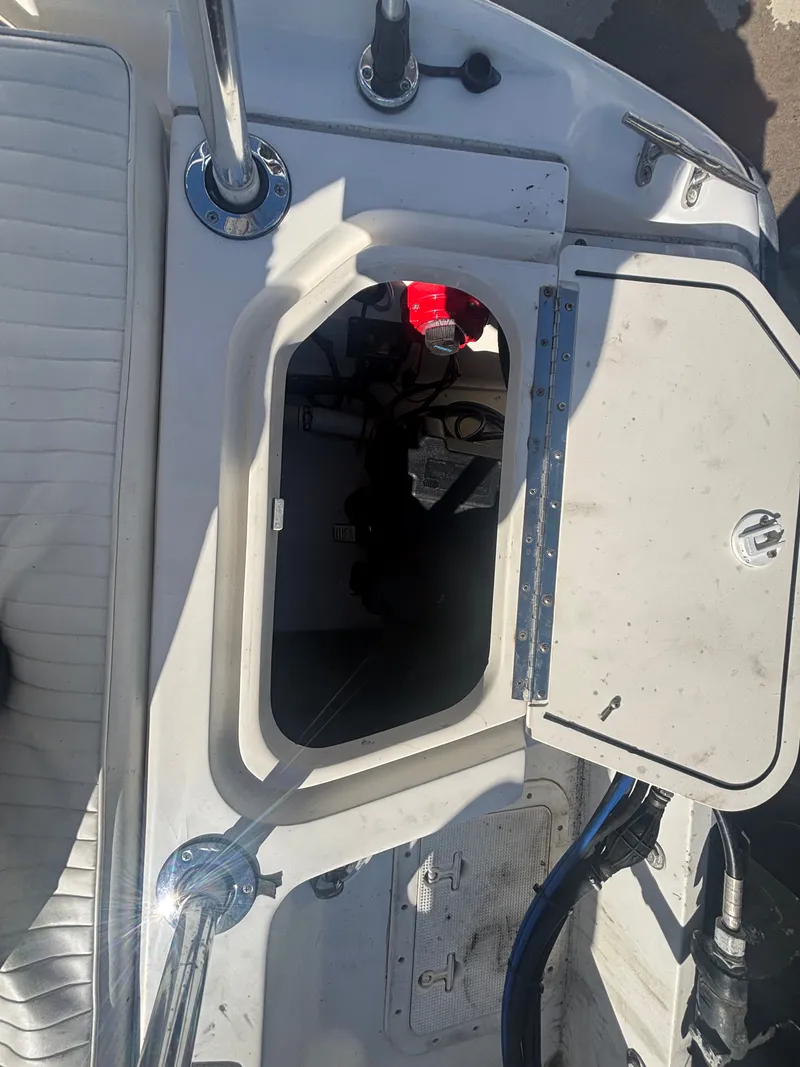 Slide: The Image of Storage compartment in a 2000 Boston Whaler 180 Dauntless boat. - 21