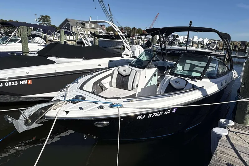 The Image of 2018 Monterey 278SS Super Sport boat docked at marina, featuring sleek design and modern amenities. - 1