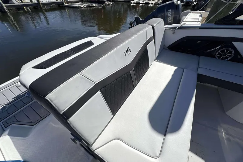 Slide: The Image of 2018 Monterey 278SS Super Sport boat interior with stylish seating and waterfront view. - 17