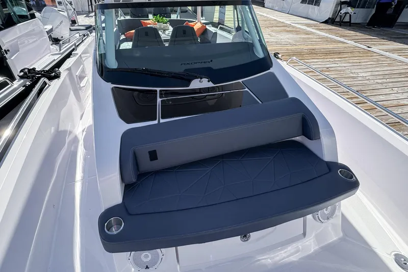 Slide: The Image of 2026 Axopar 29 Sun Top boat with sleek seating and modern design. - 17