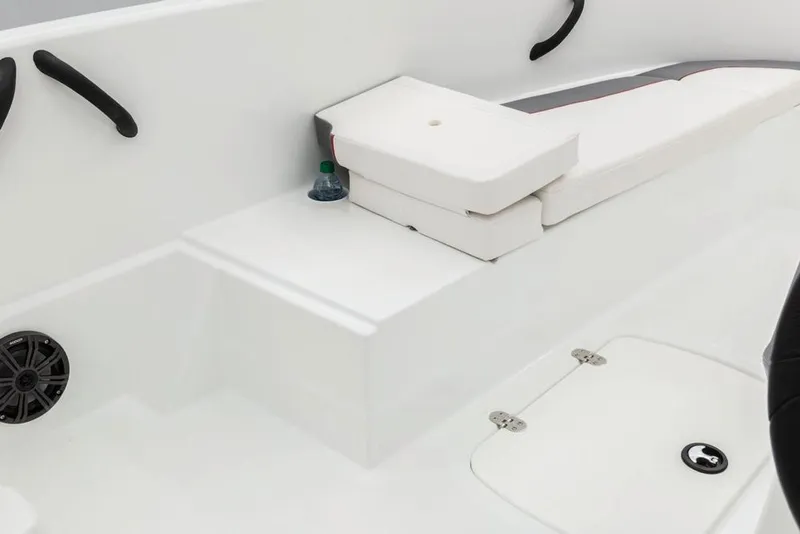 Slide: The Image of 2020 Tahoe T16 boat interior with white and red seating, steering wheel, and control panel. - 18