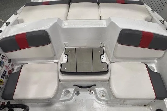 Slide: The Image of 2020 Tahoe T16 boat dashboard with steering wheel, gauges, and Garmin navigation system. - 24