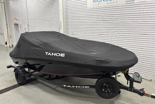 Slide: The Image of 2020 Tahoe T16 boat cockpit with steering wheel, control panel, and navigation display. - 3