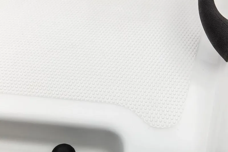 Slide: The Image of 2020 Tahoe T16 boat interior with white and gray seating, red accents, and storage compartments. - 31