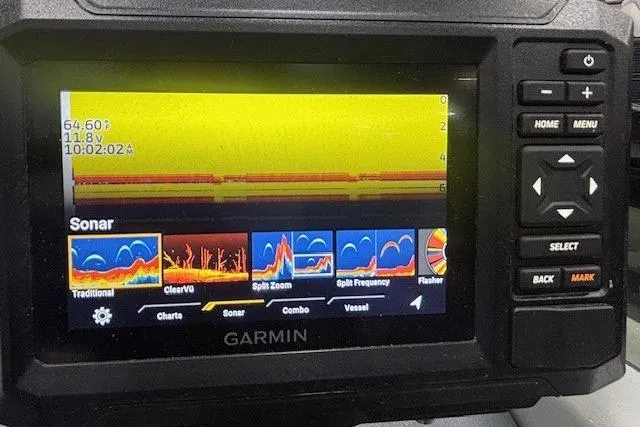 Slide: The Image of Boat propeller of a 2020 Tahoe T16 on a garage floor. - 41