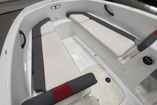 Slide: The Image of 2020 Tahoe T16 boat on trailer, covered, with visible wheel and branding. - 43