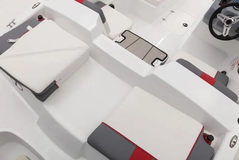 Slide: The Image of 2020 Tahoe T16 boat interior with white and gray seating, red accents. - 6