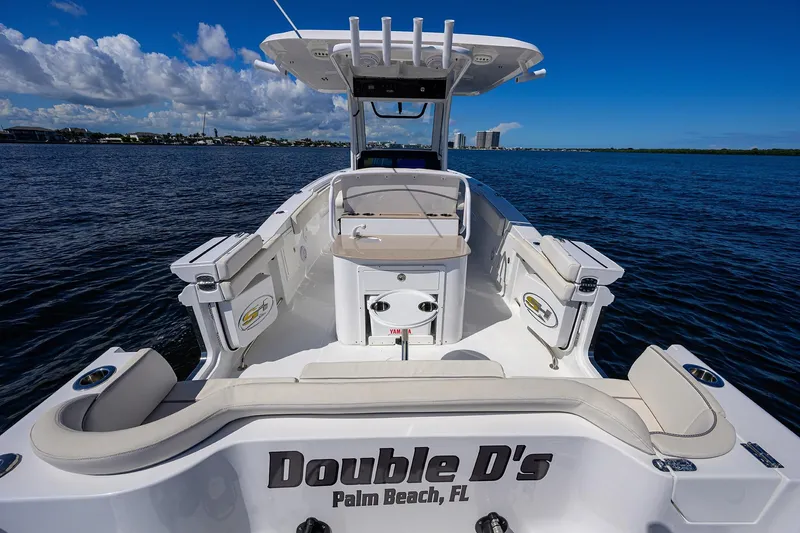 Slide: The Image of 2024 Sea Hunt Ultra 305 SE boat on water, Palm Beach, FL. - 31