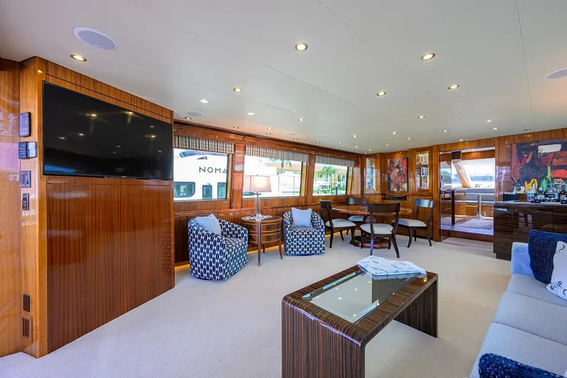Slide: The Image of Luxurious interior of 2009 Hatteras Enclosed Bridge yacht with elegant furnishings and modern decor. - 2