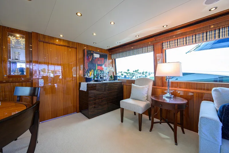 Slide: The Image of Luxurious interior of 2009 Hatteras Enclosed Bridge yacht with elegant furnishings and decor. - 4