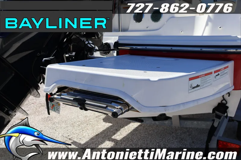 Slide: The Image of 2023 Bayliner DX 2000 boat platform with ladder, Antonietti Marine branding. - 10