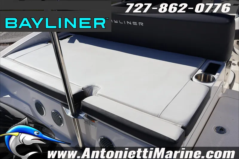 Slide: The Image of 2023 Bayliner DX 2000 boat seating area with cup holder, displayed by Antonietti Marine. - 12