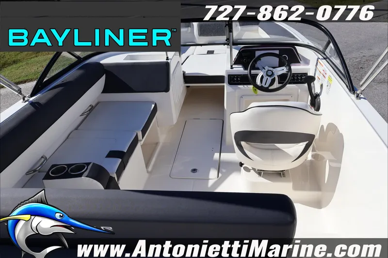 Slide: The Image of 2023 Bayliner DX 2000 boat interior with seating and steering wheel, Antonietti Marine branding. - 13