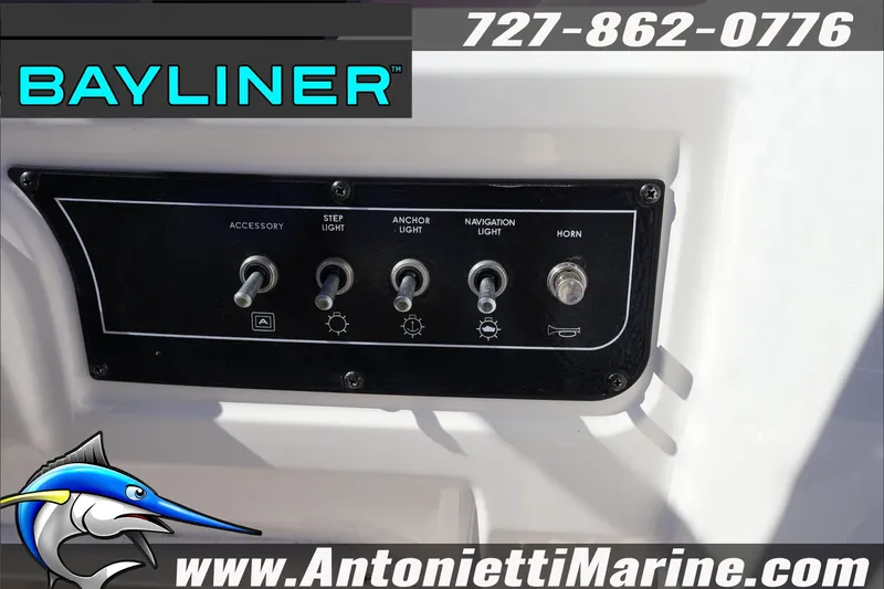 Slide: The Image of Control panel of 2023 Bayliner DX 2000 boat with switches for lights and horn. - 20
