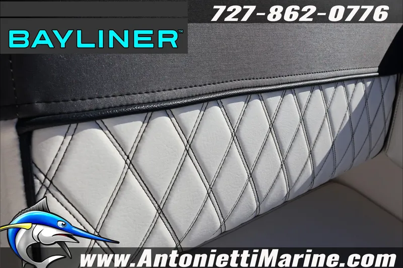 Slide: The Image of 2023 Bayliner DX 2000 boat interior with diamond-stitched upholstery, featuring Antonietti Marine branding. - 35