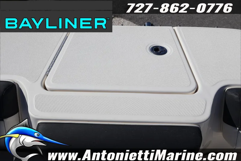 Slide: The Image of 2023 Bayliner DX 2000 boat deck with contact information and logo. - 36