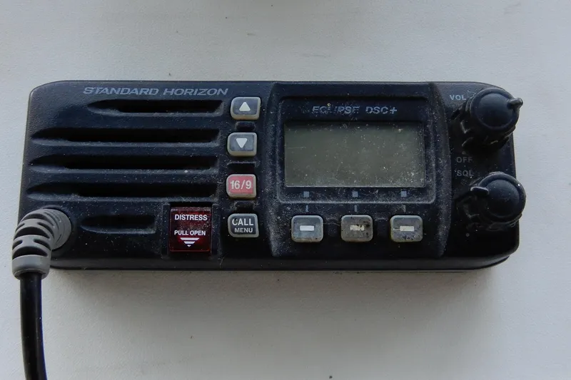 Slide: The Image of Standard Horizon marine radio on a 1989 Jefferson 46 Sundeck boat. - 24