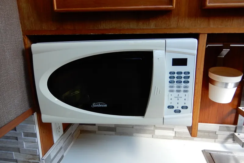Slide: The Image of Sunbeam microwave in 1989 Jefferson 46 Sundeck yacht kitchen. - 39