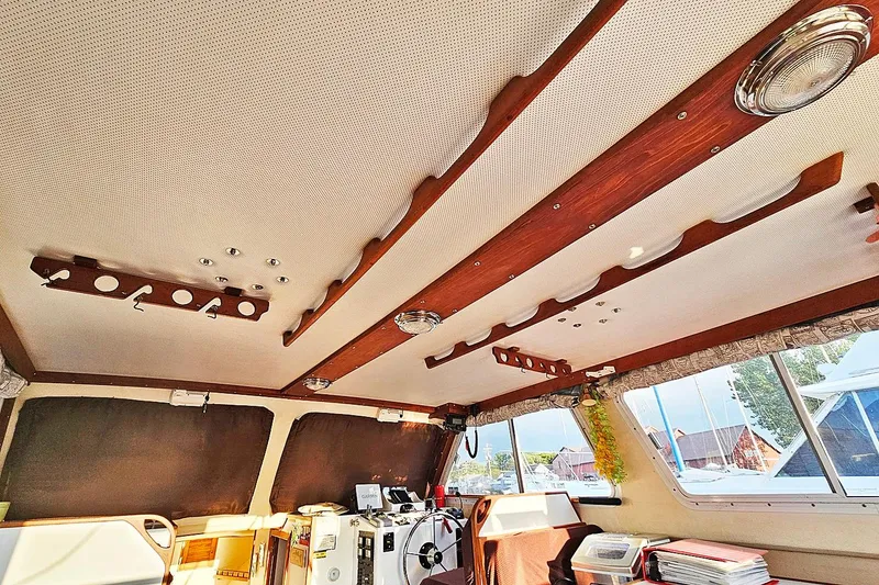 Slide: The Image of Interior of 2010 Eastern Casco Bay 35 boat with wooden ceiling accents. - 16