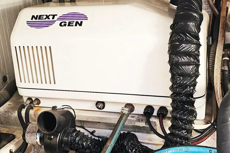 Slide: The Image of Next Gen generator in 2010 Eastern Casco Bay 35 boat engine room. - 23