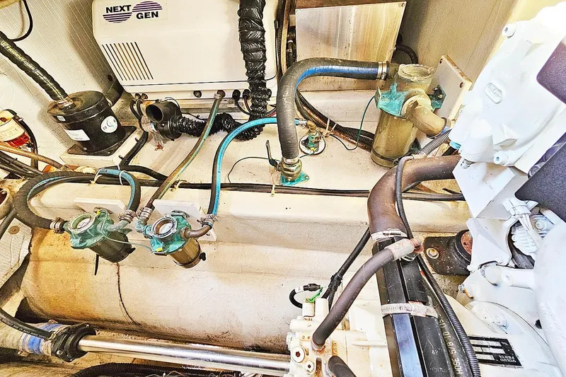 Slide: The Image of Engine room of 2010 Eastern Casco Bay 35 boat with visible mechanical components. - 25