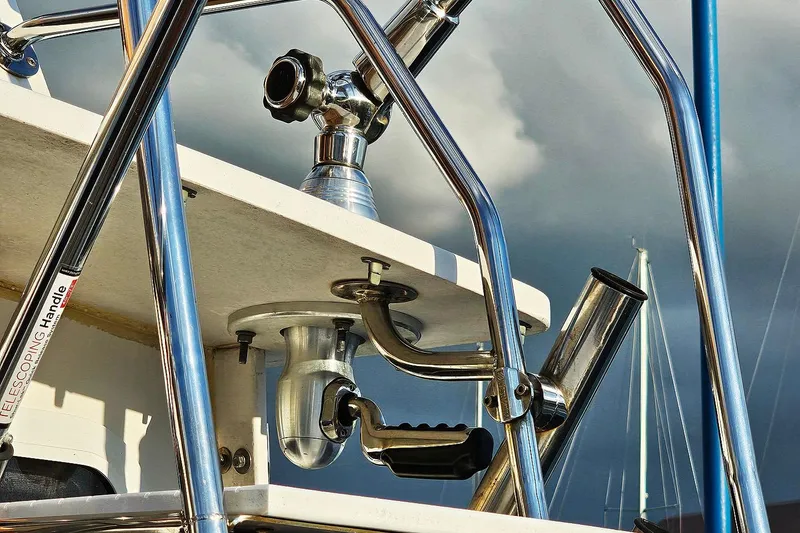 Slide: The Image of Close-up of Eastern Casco Bay 35 boat equipment, featuring metal railings and fittings, 2010 model. - 8