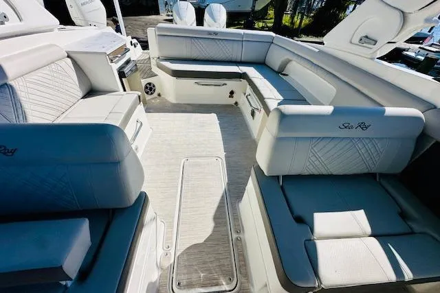 Slide: The Image of Luxurious 2025 Sea Ray SDX 290 Outboard boat interior with spacious seating. - 20