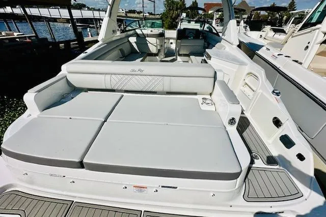Slide: The Image of 2025 Sea Ray SDX 290 Outboard boat with spacious seating and sleek design. - 5