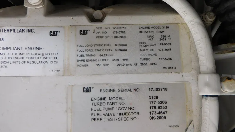 Slide: The Image of Caterpillar engine specifications on a 2002 Sea Ray 380 Sundancer. - 21