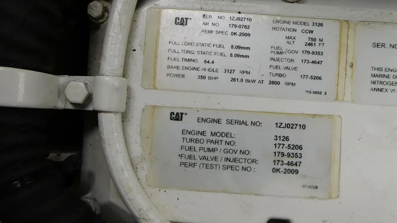 Slide: The Image of CAT engine specifications on a 2002 Sea Ray 380 Sundancer. - 22