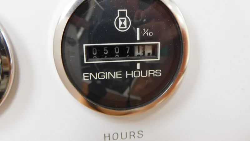 Slide: The Image of Engine hour meter showing 507.1 hours on a 2002 Sea Ray 380 Sundancer. - 26