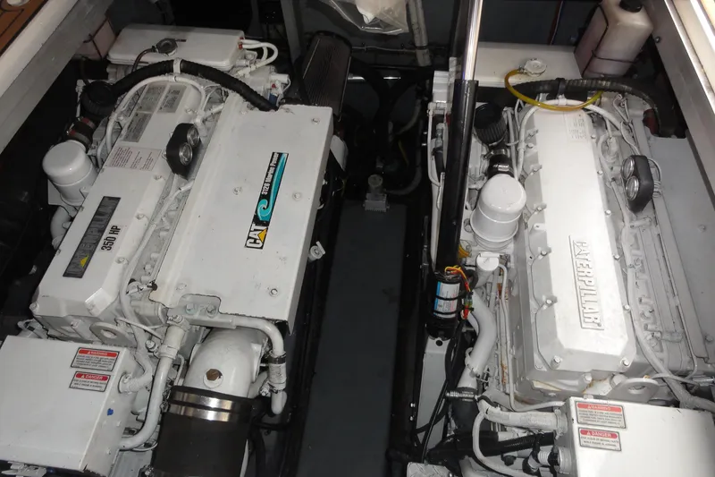 Slide: The Image of Engine room of 2002 Sea Ray 380 Sundancer with twin Caterpillar engines. - 53