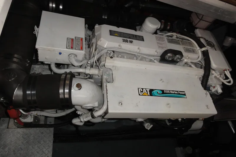 Slide: The Image of Engine of a 2002 Sea Ray 380 Sundancer, featuring CAT 3126 Marine Power. - 55